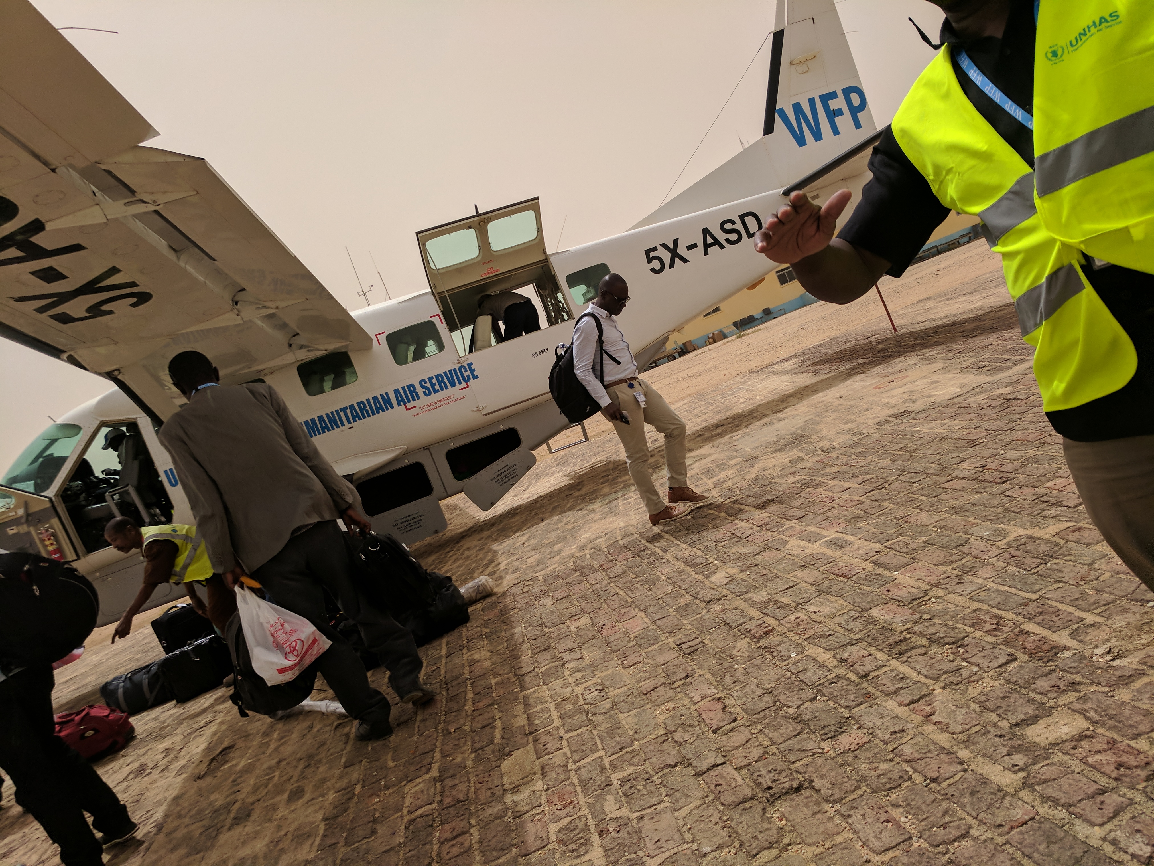 Boarding a WFP UNHAS humanitarian flight in the field